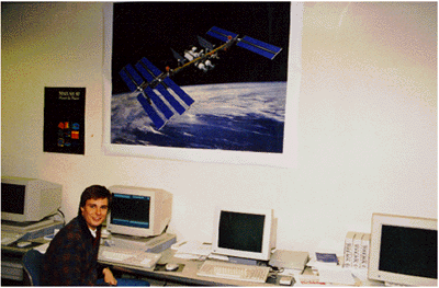 a photo of Mr. Barker at a computer workstation